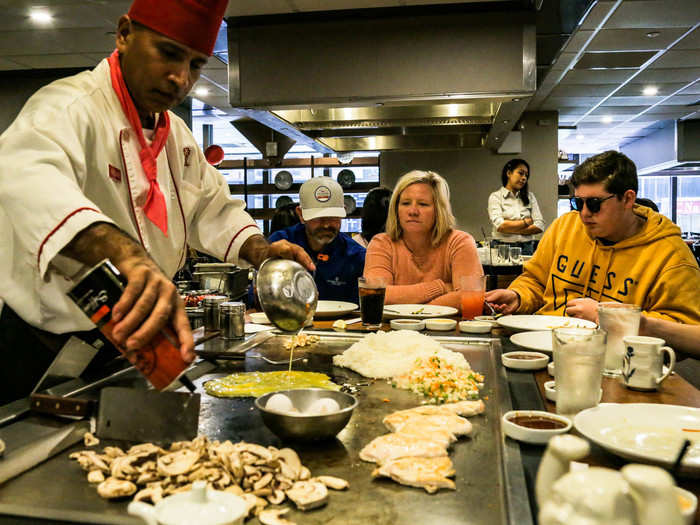 With all the ingredients on the table, Chef Haque began assembling the fried rice.