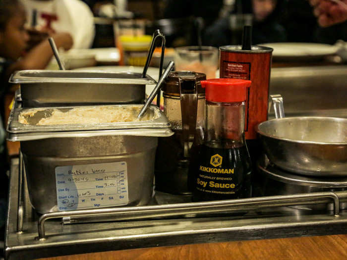 On the cooking cart, there were Japanese cooking staples like soy sauce and sunflower oil. However, the large tub of garlic butter stood out to me as a distinctly American condiment.