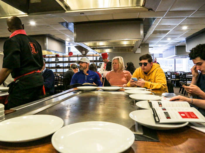 I was seated at a grill with a Texan family and a pair of Californian cousins who were studying in New York. The communal dining set-up encouraged us to converse, and I learned that both parties were regular Benihana fans. When our server arrived, he asked us if it was anyone