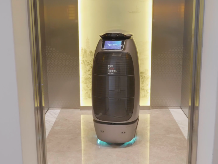 Once a request is made, the robot makes its way to the room. Here, a robot is seen boarding an elevator.