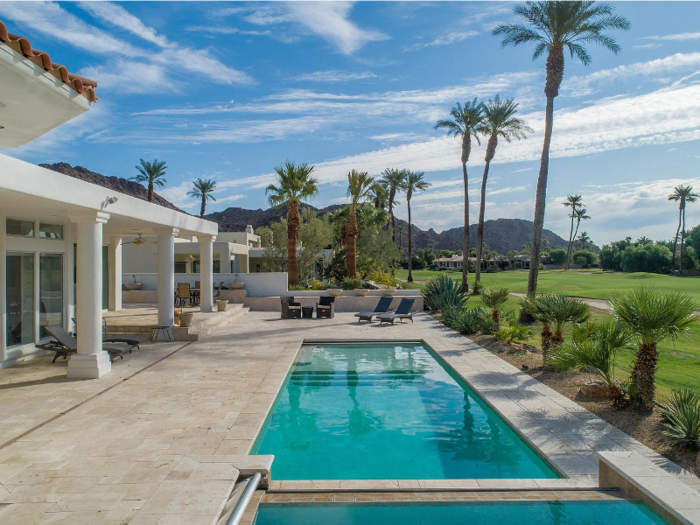 The patio has both a pool and a spa.