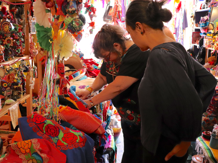 A costume designer came in to find Mexican dresses for a play.