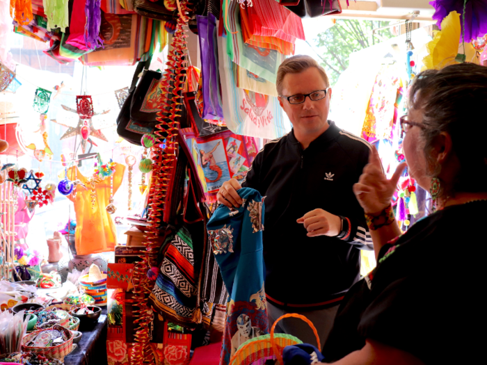 The moment customers walk in, Leor jumps up to show them around and teach them about Mexican culture.