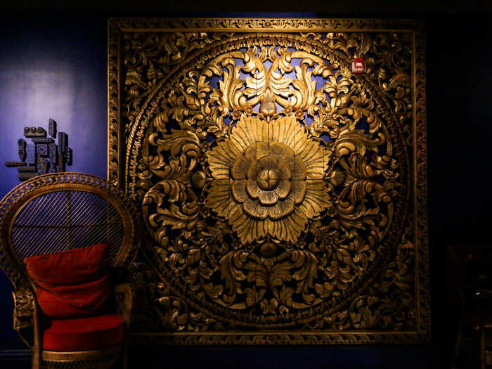 This elaborate wood carving is the twin of a wood carving I saw in photos for the Hong Kong location of Helen