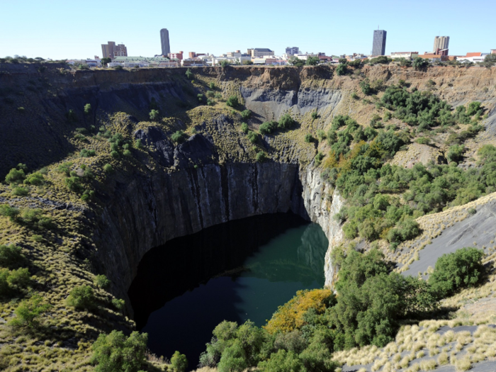 Other than drilling for science, or oil, miners have also made some massive holes. One of the largest man-made holes in the world is Kimberley Diamond Mine, in South Africa, also known as "big hole." Its circumference is nearly 1 mile, and it