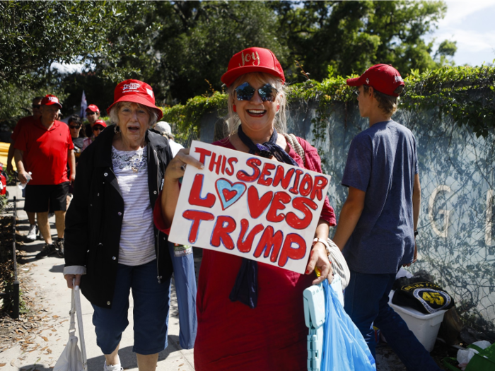 This woman brought a sign with her to a Trump rally in Orlando, Florida, which says, "This senior loves Trump." She