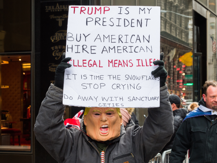 This masked Trump supporter set out a few thoughts, including encouraging people to "Buy American" and "Hire American." And if someone doesn