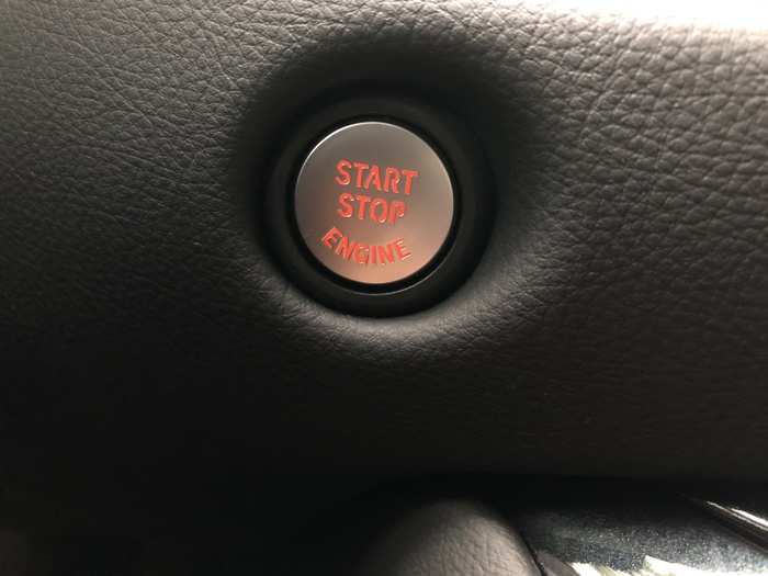  The push-button start-stop is awkwardly located behind the wheel. 