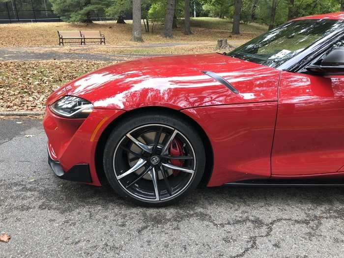 The hood creates a compelling illusion of length, giving the Supra a GT car