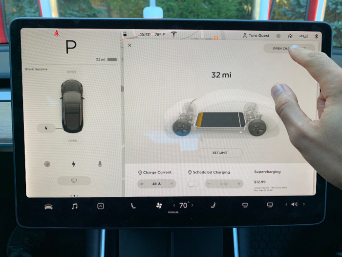 I used the touchscreen to open the charge port.