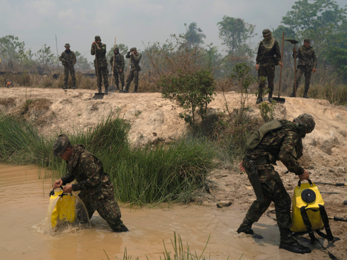 They use all of the tools they have on hand. Water bags are refilled from nearby streams ...