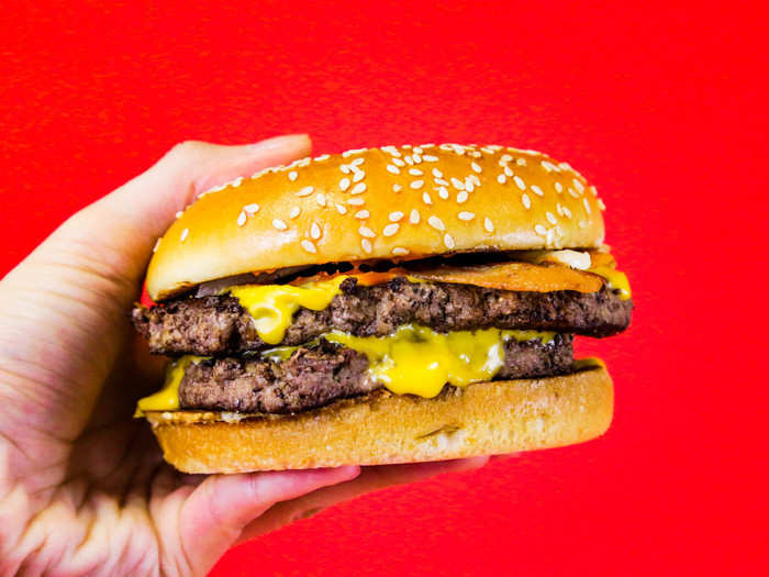 With two quarter-pound patties, this burger weighs in at roughly half a pound of beef when uncooked. It