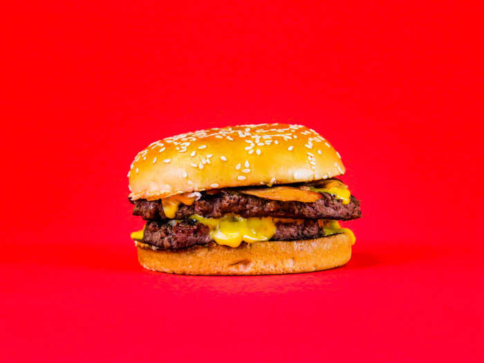 The Double Quarter Pounder with bacon and cheese is made with two quarter-pound fresh beef patties, a bun, two slices of American cheese, bacon, ketchup, pickle slices, onions, and mustard. It was made a permanent addition to the menu in March after McDonald