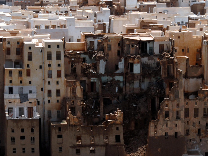 The flooding caused damage to several buildings and toppled some of its mud brick towers.