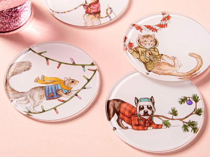 Whimsical coasters adorned with fashionable animals