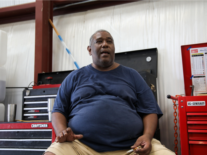 Bennie Parks, aged 52, works in the garage two days out of the week performing oil changes and car inspections, among other services.