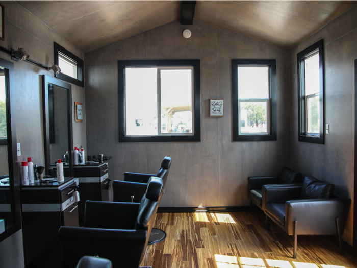 Stylists from a local mom-and-pop hair salon visit the property regularly to receive residents as clients in an on-site barbershop.