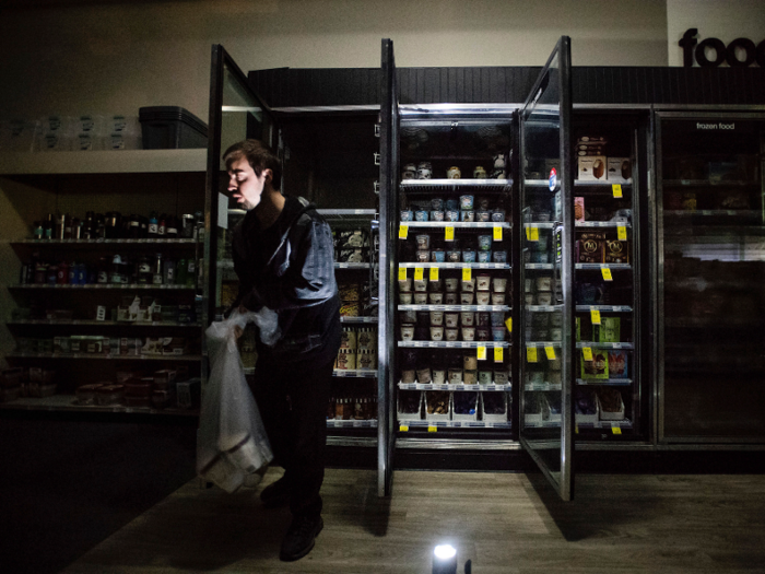 Household fridges and supermarkets filled with perishables will suffer. There will be casualties — in this case, ice-cream is being thrown out.