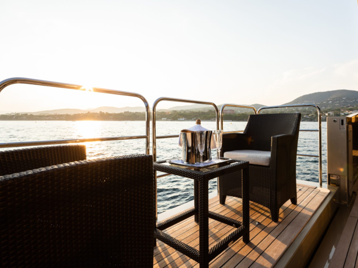 A folding balcony offers an additional spot to enjoy the sunshine and look out over the water.