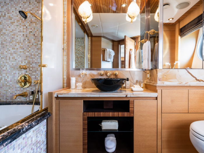 The luxe master bathroom comes with a deep soaking tub.