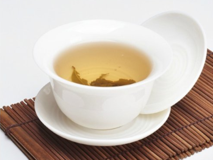 A traditional gaiwan tea brewer