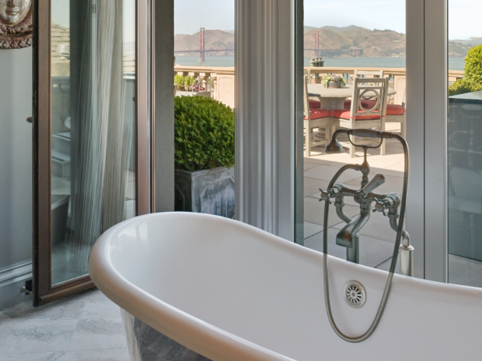 The master bathroom offers stunning views of the San Francisco Bay.