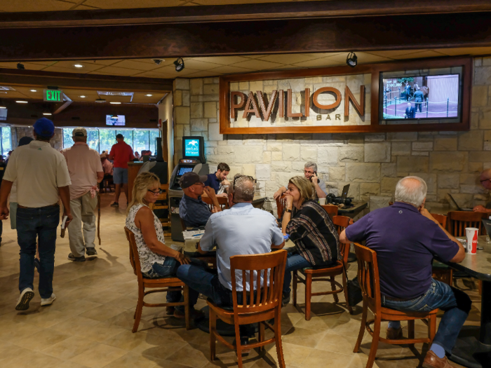 Keeneland offers several dining options for guests at its horse sales. For casual bites, attendees can stop at the Pavilion Bar within the sales pavilion.