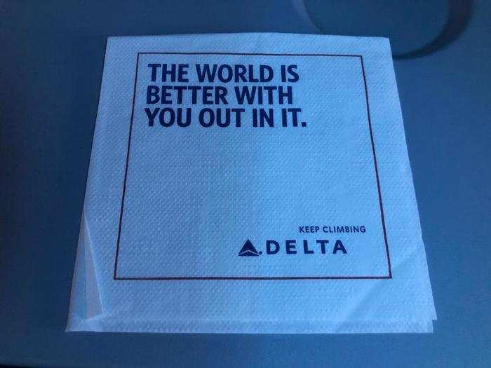 Drink service came first, with this bizarrely worded napkin ...