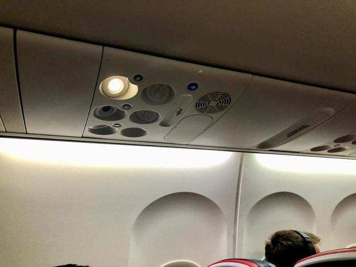 There was an individual reading light and air vent for each seat. I opened my air vent all the way, which helped minimize the smell from the lavatory.