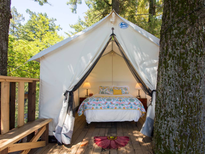  The 400-square-foot platform has a queen bed, electricity, and WiFi, with a full bath downstairs. 