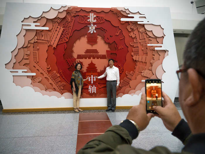 This sculpture was particularly popular among travelers. The Chinese characters in the middle say "Beijing, central axis."