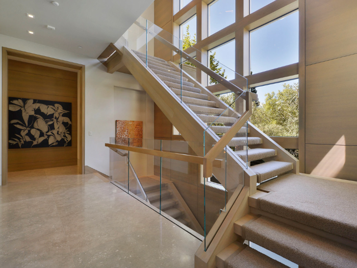 An elevator serves all three levels of the home.