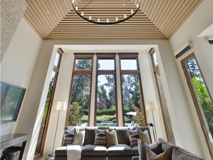 The light-filled home, designed by Olson Kundig, features high ceilings and large windows.