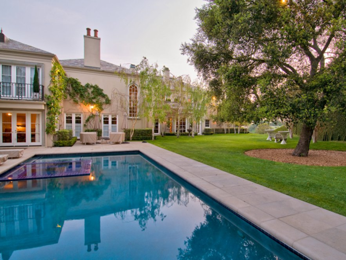 The backyard has a pool ...