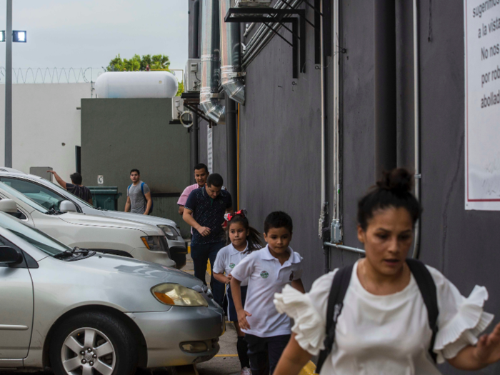 Residents ran for cover, as shots were heard through the streets, and fighting continued on into the night. People on social media shared videos of parents stopping their cars on the street and telling their children to stay down close to the ground.