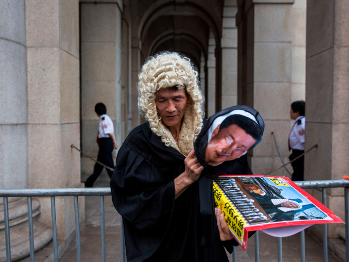 Hong Kong chief executive Carrie Lam banned face masks shortly after in effort to de-escalate the conflict. Lam said masks have been used to promote "radical behavior" among protesters.