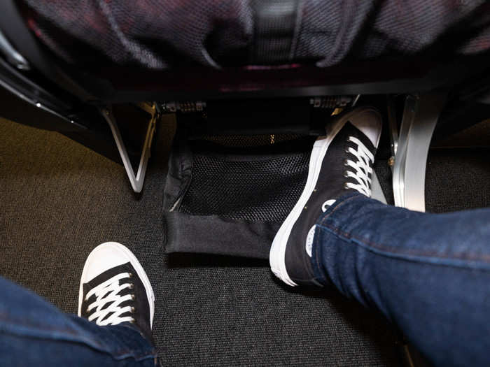 Economy seats also have an adapted version of the premium economy footrest, which was definitely an improvement.