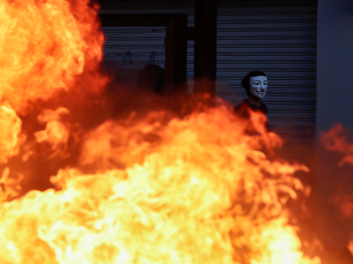 Protests continued through Saturday. Buildings were set on fire, and thousands continued to march through the streets in Santiago.