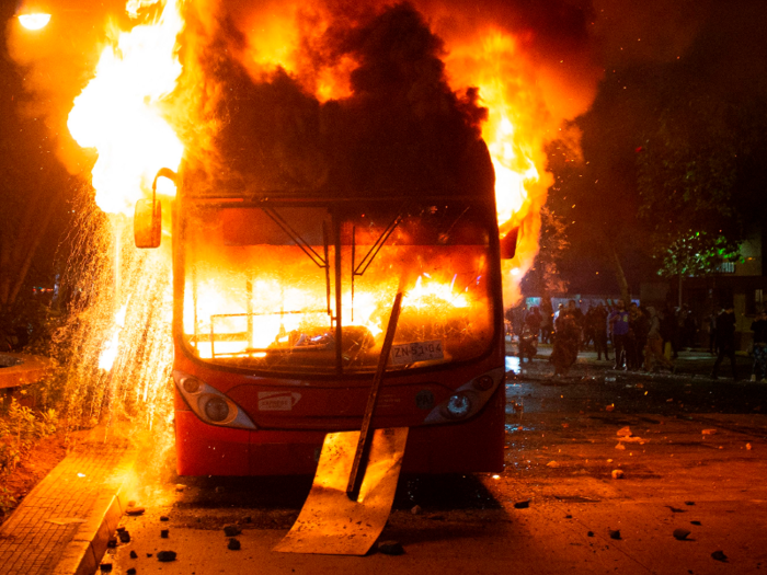 Without access to subway stations, protesters set fires at station entrances and to public buses, and looted and vandalized streets and storefronts.