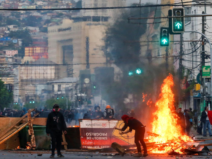 The government also took swift action to invoke a law that would then allow them to harshly prosecute the "true criminals" involved in damaging the subway system, Chile