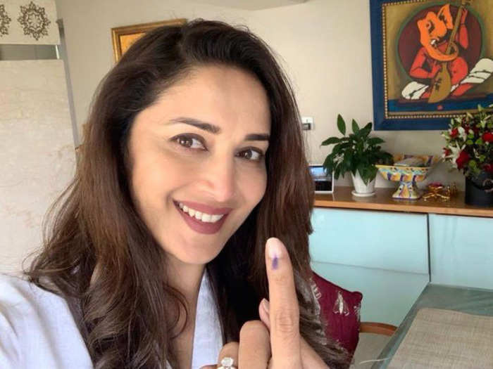 Veteran actress Madhuri Dixit also joined the early birds and cast her vote at the Bandra (West) polling booth.