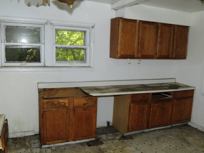 When the home was purchased, the cabinets in the kitchen were worn down, dirty, and had missing parts.