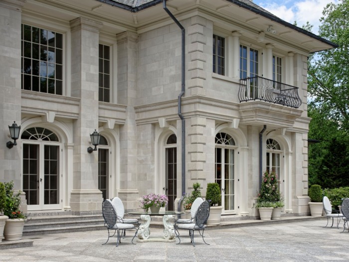 Designed by architects Shope Reno Wharton, the house has a stately limestone exterior.