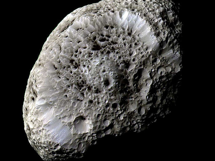 As it swung around Saturn, Cassini also snapped photos of Hyperion — the weirdest-shaped moon in the solar system — in 2005.