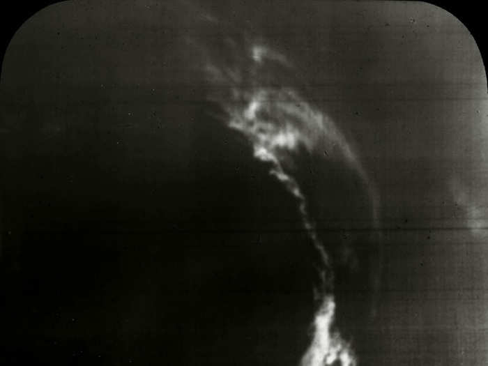 Much closer to Earth, a bright eruption of plasma on the sun was captured in this 1931 photograph.