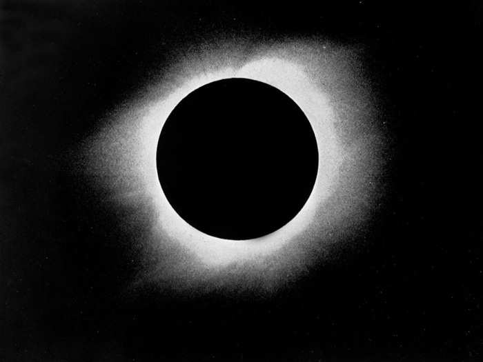 Solar eclipses were good fodder for early astronomical photos, too. The solar corona is visible behind the moon in this 1922 image of a total solar eclipse.