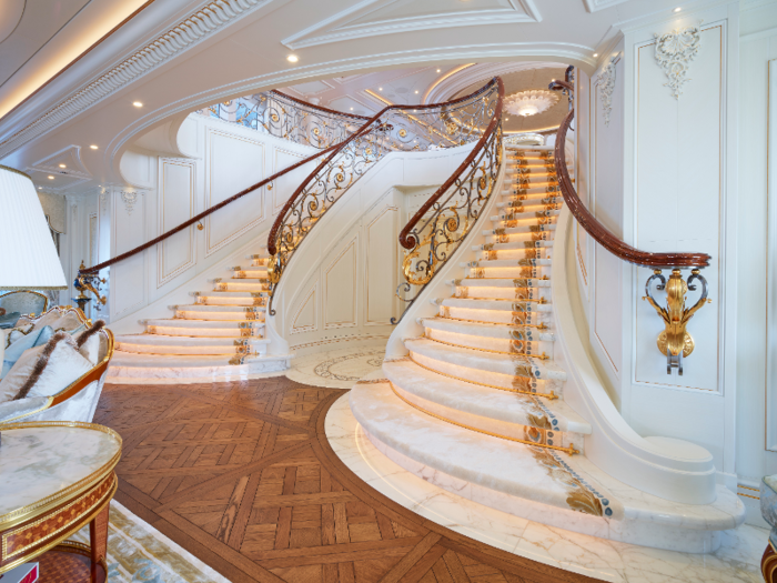 In the formal entrance lobby is an elaborate marble staircase with 23.8 carat gold handrails that were inspired by Le Bristol hotel in Paris.