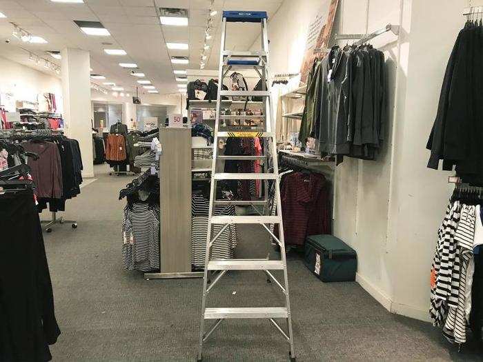 As we neared the back of the store, we saw several signs of a store in transitional flux, including this ladder in the middle of the store ...