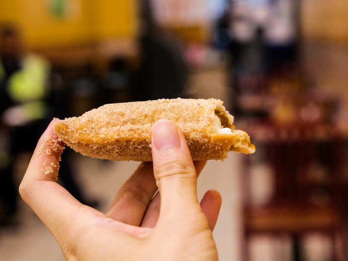 But one bite of the pie made me forget all my mortal troubles. My lips were greeted by a gentle layer of sweet cinnamon powder and my teeth were met by a flaky, crispy crust that oozed buttery filling when bitten.