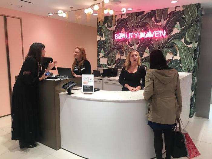 At the top of the stairs, I saw customers making reservations for spa services at Nordstrom Beauty Haven.